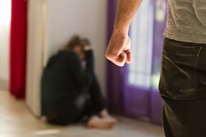 Man with a Balled Up Fist and Woman on the Floor